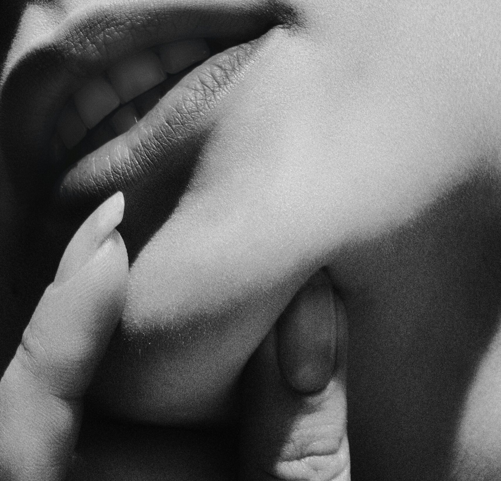 girl grabing her chin with her hand
